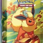 Pokémon TCG: Scarlet & Violet—Prismatic Evolutions Mini Tin – Flareon (2 Booster Packs & 1 Coin)